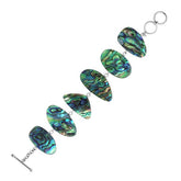 Sterling Silver bracelet with shimmering Abalone Shell panels, handcrafted in Bali.